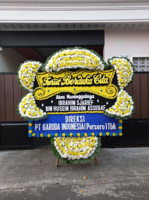 Papan Bunga Duka di Kadolomoko